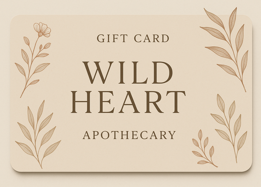 A stylish gift card design for Wild Heart Apothecary featuring botanical elements and earthy colors